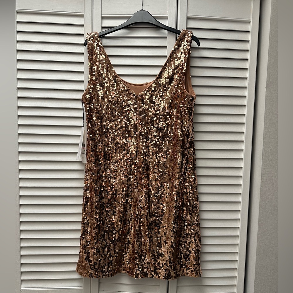 Calvin Klein gold sequin mini dress. NWT. Back zip.